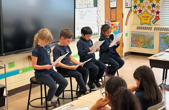 Students Reading in Front